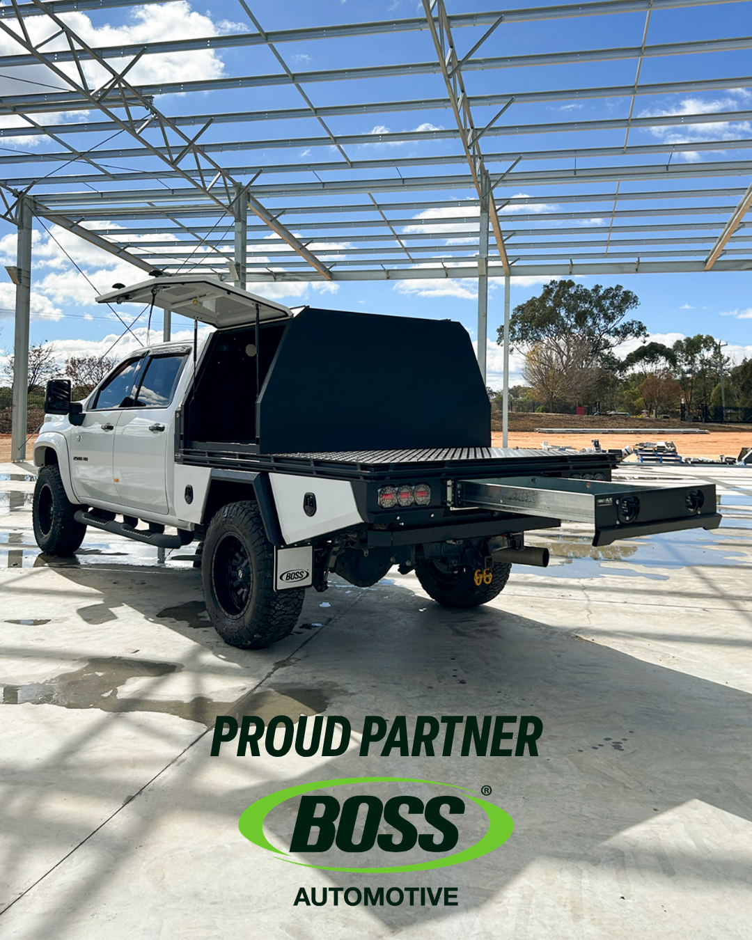 RAM 1500 with Boss Automotive tray and canopy setup